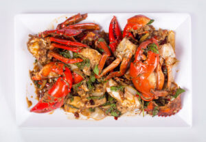Crab Legs in bulk, seasoned with Thai dish